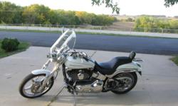 2004 HARLEY DAVIDSON DEUCE.THE BIKE COMES WITH A FACTORY SECURITY SYSTEM AND GARAGE DOOR OPENER. LOTS OF CHROME ON THIS BIKE. IT ALSO HAS BILLET CONTROLS AND WHEELS.IT HAS BEEN MAINTANED USING HARLEY SYNTHETIC LUBRICANTS SINCE NEW. THE LUCKY BUYER WILL