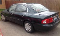 4 door, 96,000 miles, dark green, excellent condition. One owner. Call 937-233-5473 and make an offer.