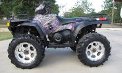 THIS 4 WHEELER IS IN EXCELENT CONDITION , HAS 2 INCH LIFT WITH ALUMINUM WHEELS AND 27" TIRES . IT HAS COLECTED DUST IN MY SHOP FOR OVER 2 YEARS AND. GETS RIDDIN RARELY . IT HAS THE CAMO PRINT . I AM THE 3RD OWNER AND I KNOW BOTH PREVIOUS OWNERS SO I KNOW