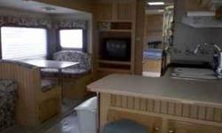 2005 31' Trail Lite by Trail Bay Trailer. Sleeps 6. Excellent condition. Books for $16455.Willing to sacrifice for $14,500. Have all paperwork for all appliances, parts etc. For more pictures please e-mail, it was difficult to get good pictures with my