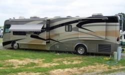 This quality motorcoach, put in service in April 2005, has been beautifully maintained by proud retirees, is in excellent condition and has a very extensive list of luxury options. Tiffin Standard Features: Sunlit Sand Exterior, Mineral with Maple