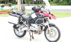 2005 BMW R1200GS with only 9336 miles.
Every where I go I get looks and comments about what a cool bike. Complete from
factory with ABS, heated grips, handguards, BMW Vario expandable cases with BMW
interior luggage. All service including 6,000 mile
