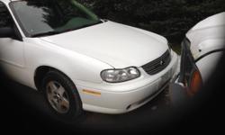 This 2005 Chevy Malibu Classic Sedan in white has grey cloth interior with a 4 cylinder and a automatic with air, power windows and locks, tilt and cruise a am:fm. This car is very clean with a clean carfax and 122,000 1 owner miles and comes with a new