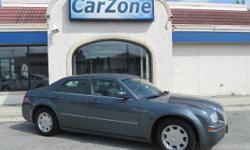 2005 CHRYSLER 300 LIMITED | Magnesium Pearlcoat with Grey Leather Interior | A Consumer Guide 2005 Best Buy, the Chrysler 300 was named Motor Trend's Car of the Year. It also won the AutoWeek Readers Choice Award, was named Money Magazine Car of the Year,