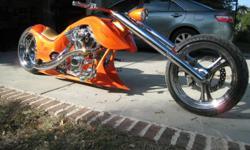 2005 softail bike called "Judgement Day". It is custom built from the ground up with the best of the best. The frame and all of the sheetmetal fabricated by hand. It has a single sided billet swingarm machined out of one solid block of aluminum and a