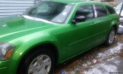 2005 Dodge Magnum 180k custom paint job has electrical problem runs and drive clean and clear title contact me for more info 816 406-6354