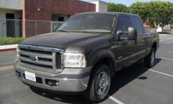 2005 ford f-250 v-8 diesel power stroke crew cab 4-door grey 120,000 miles beige leather interior salvage title must see