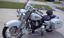 Meticulously maintained 2005 Harley Davidson Road King.
26,000 miles, 95ci fuel injected (1550 screaming eagle) Factory cruise control. Upgraded air intake (HD Screaming Eagle) and Vance and Hines Fuel Pak.&nbsp; Chrome front end.&nbsp; Chrome handle bar