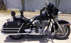 I currently have a 2005 Harley Davidson Electra Glide for sale. This bike is a full fairing bagger with an 88 inch (1473 cc ) V-twin, 5 speed, air and oil cooled, belt drive. The bike has new full floating rotors, Python True Dual Headers, good tires and