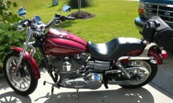 2005 Harley Davidson Dyna Super Glide Custom FXDC(Chrome Package). 1450 C.C. Engine. Carbureted, 5700 Miles, One owner, been garage kept since day one. This is a clean bike with no dents, dings, etc... I added about $2000.00 in extras which include chrome