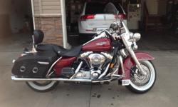 Its a must see Harley Road King only 8083 miles, Well kepted and the Newest 2005 you will ever run accross.
