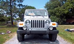 2005 Jeep Wrangler Sport for sale. 63,000 miles, silver exterior, blk interior, blk soft top, 6 speed manual, inline 6, 4 wheel drive, compass on rear view, privacy glass, running boards, fog lights, interior in excellent condition as well as exterior.