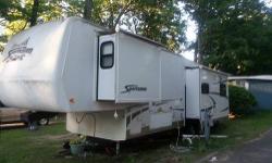 ****Below Blue Book Value****This is a must see beautiful 5th wheel!!! All brand new appliances indoor and outdoor are also available with the sell. New 40 inch and 24 inch flat screen tv's have just been added. Very low mileage on this beauty!! Bike rack