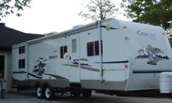 Lite weight, can be towed by half-ton truck. Quad bunks, master bed, full shower, wood floors, smooth side fiberglass, new tires, new battery, 12ft living room slide-out, 20ft awning, plenty of storage, very clean, no problems. Alot of unit for the money.