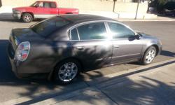 2005 Nissan Altima 5 speed, 4cyc clean title, good tags til Feb 2015, AC PS CC CD, tinted window, runs great, asking $4495 call --