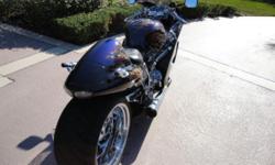 2005 SUZUKI HAYABUSA CUSTOM SHOWBIKE. THIS BIKE HAS A ONE OF A KIND PAINTJOB BY WORLD RENOWNED ARTIST CHRIS CRUZ. THE PAINT ALONE WAS&nbsp; $ 6,000. THE REAR HAS A 300MM TIRE CHROME SINGLE SIDE SWINGARM ,WHEELS ARE PERFORMANCE MACHINE INVADER CHROME FRONT