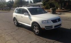 2005 VOLKSWAGEN TOUAREG , LEATHER , SUN ROOF , NAVIGATION SYSTEM , ROOF RACK , FULLY LOADED , RUNS PERFECT , WARRANTEED 30 DAYS OR 1000 MILES , CLEAN TITLE, 132K MILES . FINANCING AVAILABLE , EASY FINANCING & LOW MONTLY PAYMENTS , NO CREDIT , CASH INCOME,