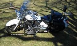 White 2005 Yamaha V Star 1100 Classic, Engine guards, floor boards, saddle bags, mustang seats with 2 back rest, luggase rack, highway lights, windshield with windshield bag. straight pipes, 12 volt cigeratte lighter, throttle lock,. serviced every