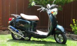 This scooter is in&nbsp;GREAT condition. Runs and looks like new. It's a 50cc engine so all you need is a Drivers Licence, no motorcycle licence required by DMV. Gets 85MPG and has a top speed of 50+ MPH! It Comes with a new helmet and gloves.&nbsp;Very