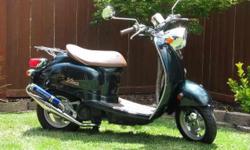 2005 Yamaha Vino Scooter in excellent condition. 5800 on it, runs great, looks great and gets 85 MPG! Also comes with a helmet in excellent condition.