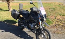 Very nice 2006 Buell Ulysses 1200cc motorcycle for sale. Hard bags, Tank bag, heated grips , &nbsp;air scoops, brand new rear tire. Black and gold and runs perfect. 34,6xx miles. Runs perfect, needs nothing. If your looking for a nice sport/touring bike