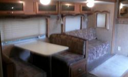2 separate bedrooms - one queen and other has double and twin bunk beds. 2 slide outs make this trailer roomy. Great for family vacations, weekends, or deer lease. A must see!