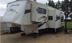 Beautiful 2006 Coachman Adrenaline 400DS. Central ducted roof air, Ducted LP furnace, Gas grill top stove and oven, Microwave/Convection Combo with hood, 2 Door Dometic Refrigerator, 10 Gal. Gas/Elec. Water Heater, 27" LCD TV, AM/FM/CD Home Theater,