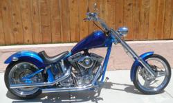 124" S&S Super Sidewinder engine (2035cc). Extremely fast 129 horsepower Street Chopper that is very fun to ride. 4800 miles. The frame is a Kraft Tech that was blue candy powder coated with a layer of silver, then blue candy powder coating. The two