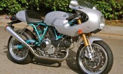 This unmolested and original example is accompanied by a file of documentation, all 3 keys (2 black and one red), code card, and a clean, clear title. Having covered only 9,800 miles from new, this bike runs perfectly, with strong and responsive power, a