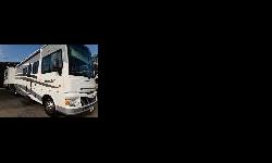 Nice 36' Gas Class A Coach with under 32000 miles.&nbsp; Lots of great featues.&nbsp; Call Jeri to make appointment to see this one.