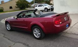 2006 Ford Mustang Convertable with only 29,000 miles. Six cylinder gets about 27 miles/gal but still has plenty of kick. Leather seats, power seats and windows, AC. Clean and in excellent condition.