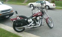 I have a 2006 dyna wide glide that i need to sell. It comes with a extended warranty, new saddle bags, windshield, new stereo system just added to the bike. Lots of chrome. Great condition. Approx miles 44,000. Bike was just serviced I believe in march.