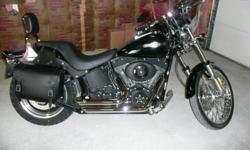 Black in color and in excellent condition. New tires, new brakes, new battery, mustang seat, vance and hines exhaust, saddlebags, fork bag, williG pegs, kuryakyn grips, windvest windshield, backrest, lowered, 13,900 miles. Factory exhaust and seat