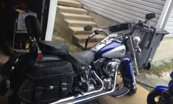 WINSHIELD - hard leather saddle bags- bike cover- screaming eagle pipes - new battery- 12,751 miles -colbalt blue/ silver