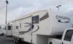 2006 KEYSTONE CHALLENGER 34TBH~ 36FT~ 3 SLIDES~ 2 BEDROOMS~ UVW= 10,920 lbs~ You are looking at a NICE 2 bedroom unit. If you have kids this is what you need, they will have their own little room, plus you still have the sofa bed in the living area. So in