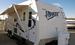 Price: $5400 -- Great condition, everything works -- 2006 Keystone Hornet Hideout 27FLS Toy Hauler -- Contact me for more photos and vehicle location.