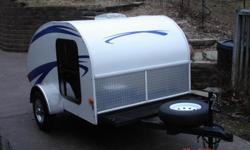2006 LITTLE GUY WORLD WIDE 5-WIDE TEARDROP CAMPER TRAILER. &nbsp;These camper trailers are hand-built in Sugar Creek, OH by skilled Amish craftsmen, making them both tough and attractive. &nbsp;This camper was refurbished and updated at the Little Guy