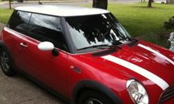 2006 MINI Cooper 72,000 miles (mostly highway miles), 5 speed manual, red and white with white stripes on the hood. In great condition, leather interior, brand new stereo system with new speakers as well. power windows, locks, mirrors. Only one owner