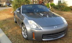 If you are looking for a thrilling ride that is fully loaded with luxury and style then look no further because this 2006 Nissan 350Z is perfect for you!&nbsp; This two door convertible features a beautiful silver exterior that is complimented by an