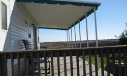 39 ft Parkmodel, 3 slideouts
2 Bedrooms, Full Bathroom with tub/shower and full size comode
Full size refrigerator, Washer/Dryer hook-up
8 x 24 ft. covered deck
Great Intercoastal Waterway View
Located at Lanier's Campground Topsail NC
Lot rent paid to