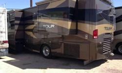 WILL DELIVER TO YOU! One owner, non-smoker, very low miles. Brown/Tan colors, 4 slide outs MATCH paint on the exterior of the unit. Diesel Pusher with built in generator, 106g fresh water, 73g grey water, and 57g black tank allow you camp both dry and