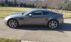 2007 Aston Martin Vantage. &nbsp;6k miles! &nbsp;Tungsten Silver exterior and Obsidian Black interior. &nbsp;Never wrecked, painted, or modified in any way. &nbsp;Always covered in climate controlled garage. &nbsp;Never driven in rain. &nbsp;Never smoked