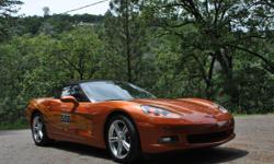 Only 5,000 miles on this 2007 Convertible Indy 500 Pace Car. Bright Atomic Orange paint with a black convertible top. There were only 500 of these special edition pace cars made. The only option available on this model was the 6 speed automatic with
