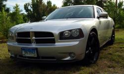 2007 Dodge Charger R/T with only 71,700 miles. Only one owner and it was kept in spectacular condition. Upgraded BORLA exhaust from CAT back and cold air intake with additional filter. Upgraded performance tires less then a year old with 20" black SRT8