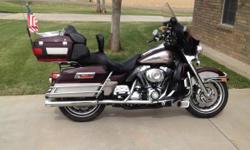 2007 Harley-Davidson Ultra Classic FLHTCU, 20717 Miles, 96 ci. Some extras include: back rest, chrome front forks, oil cooler, luggage rack, custom exhaust, 2 Harley Helmets with built in speaker system, Harley dust cover. There is about $3000 in extras