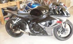2007 Suzuki GSX-R-600
I am the original owner of this beautiful, very fast, like new Suzuki.
The add on's include; lowering bars in rear, full Jardine Moto GP exhaust system, carbon fiber inserts, and much more.