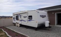 This toyhauler is clean and has't been used in over two years. It has a cover for it and we kept the windows covered. It has&nbsp;two queen beds in back which you can turn into a couch facing either way. Queen up front, two twin beds, 2