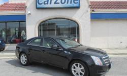 2008 CADILLAC CTS 4 | Black Raven with Beige Leather Interior | Motor Trend's 2008 'Car of the Year', the Cadillac CTS was named one of Road & Track's Top 20 New Cars for 2008. It was named a Consumer Guide 2008 'Best Buy' and named among Car and Driver