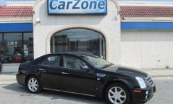 2008 CADILLAC STS 4 | All-Wheel Drive | Black Raven with Beige Leather Interior | Named on the Automobile Magazine 50 Great New Cars List, the Cadillac STS received 5-Star safety ratings from the NHTSA. Motor Trend reports ''the STS almost matches the