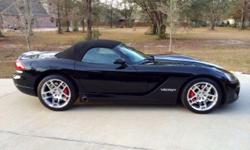 Please email me with any questions or requests for additional pics or something specific at: alysiaaaansara@uk2k.com . This 2008 Viper is in excellent condition with only 26,300 miles. Viper black with metallic silver stripes, upgrade H-Spoke wheels,